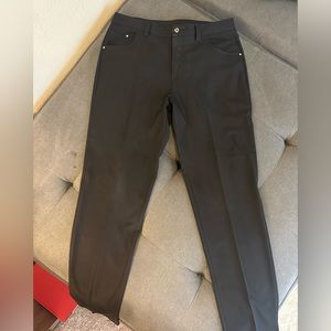 Men’s Puma golf pants size 33/32 black EUC